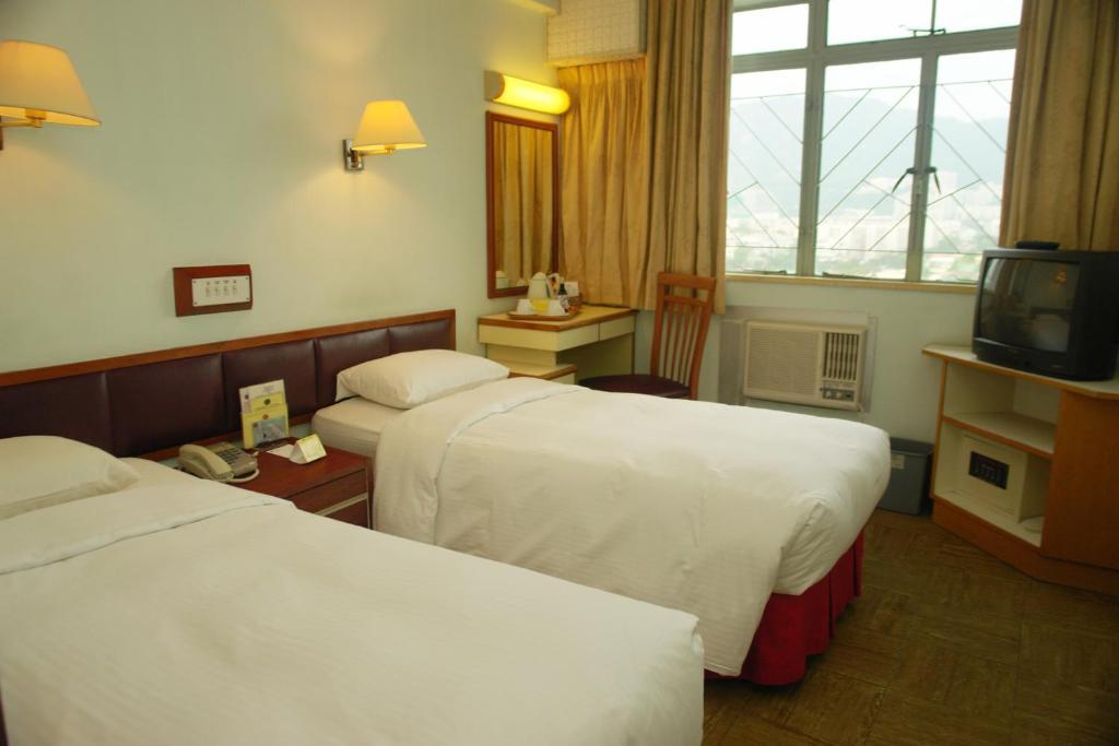 Caritas Lodge Kowloon Stadt Zimmer foto