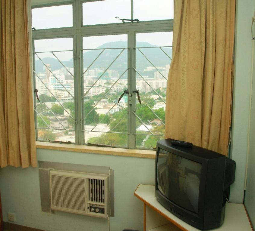 Caritas Lodge Kowloon Stadt Zimmer foto